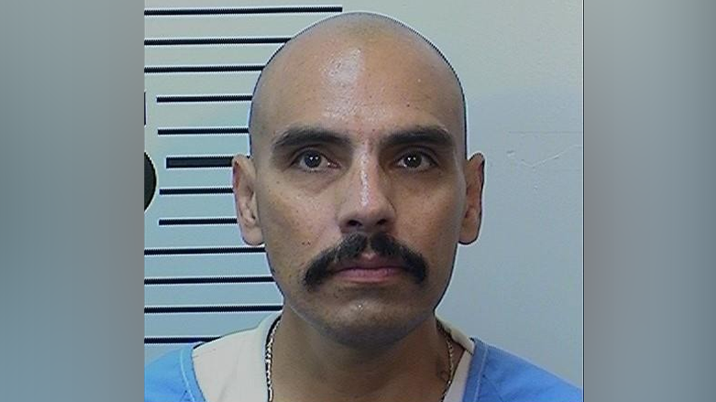 Death row inmate killed in California prison as guards deploy blast grenades to control violent mob attack